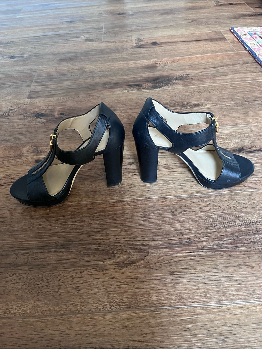 MICHAEL Michael Kors Black Leather T‑Strap Sandals with Gold Zip Accent - Picture 2 of 5